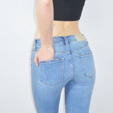 MID RISE EXPOSED BUTTON CAPRI JEANS: 7