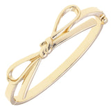 Karina Bow Wrapped Hinge Bangle in Shiny Gold