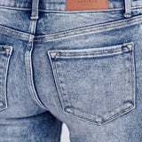 MID RISE STRETCH BOOTCUT W/ RELEASED FRAYED HEM & SLIT JEANS: 5/26