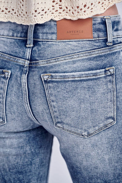 MID RISE STRETCH BOOTCUT W/ RELEASED FRAYED HEM & SLIT JEANS: 5/26